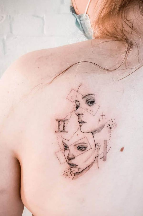 gemini two face shoulder blade tattoo