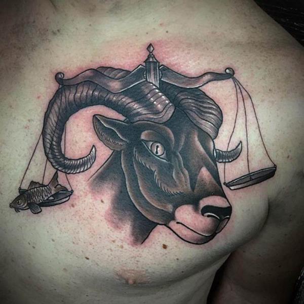 libra and taurus chest tattoo