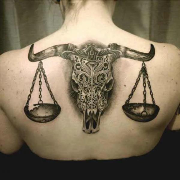 libra and taurus tattoo on back