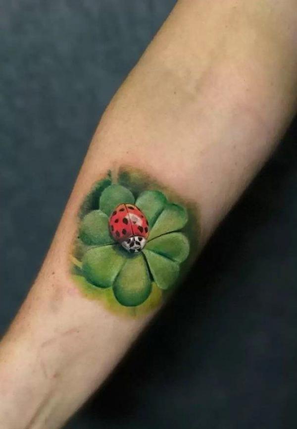 shamrock and ladybug tattoo