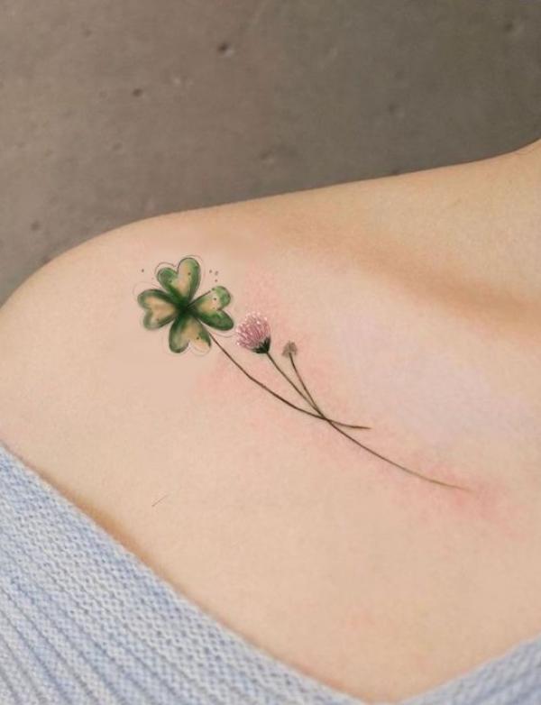 shamrock clavicle tattoo