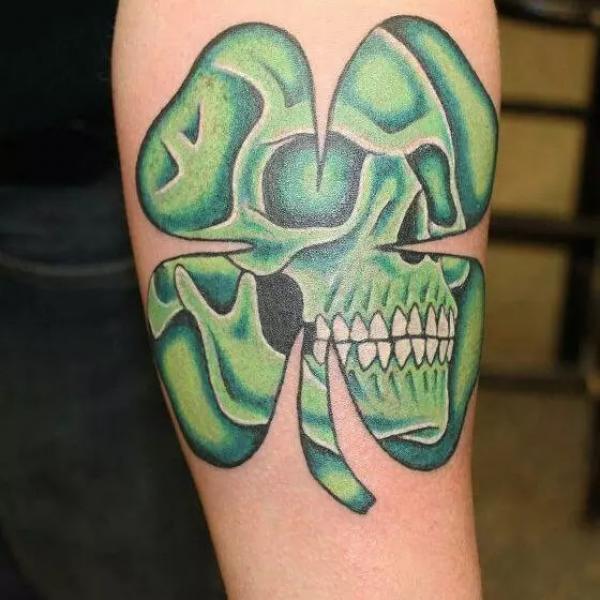shamrock skull tattoo on arm