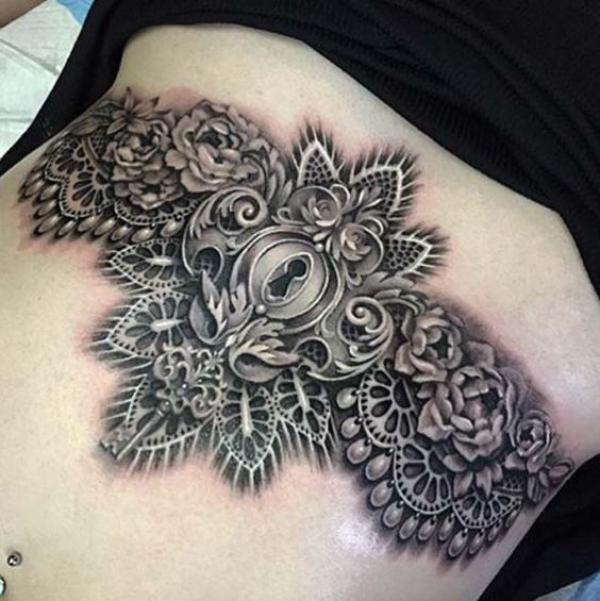 3D metallic lock with flowers stomach tattoo