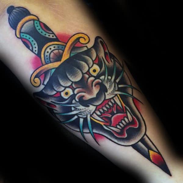 American traditional dagger through panther tattoo forearm