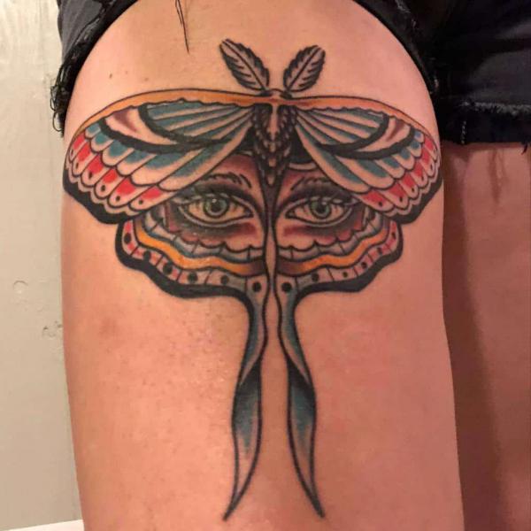 American traditional luna moth tattoo on thigh