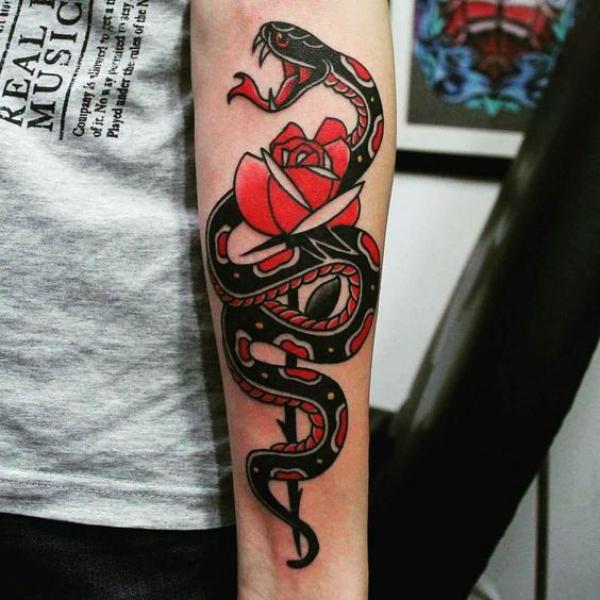 American traditional rose and snake forearm tattoo