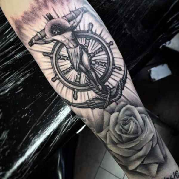 Anchor cross with Jesus ship wheel and rose tattoo