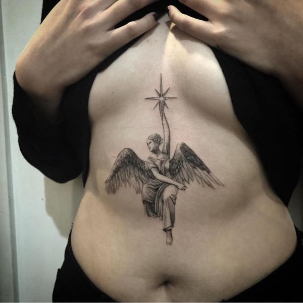 Angel stomach tattoo