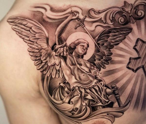 Archangel Michael wearing sword chest tattoo