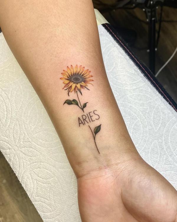 Aries and sunflower tattoo