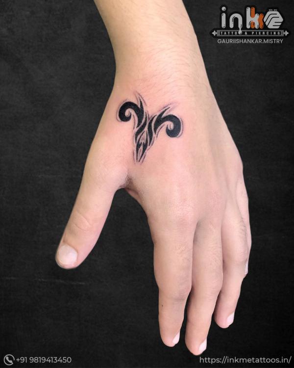 Aries webbing tattoo