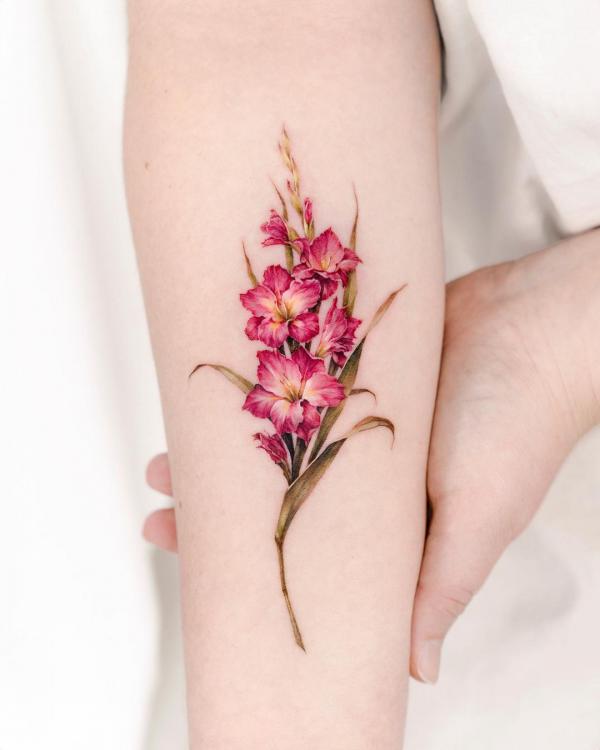 Beautiful gladiolus flower tattoo