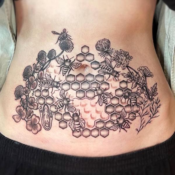 Bee and honeycomb stomach tattoo