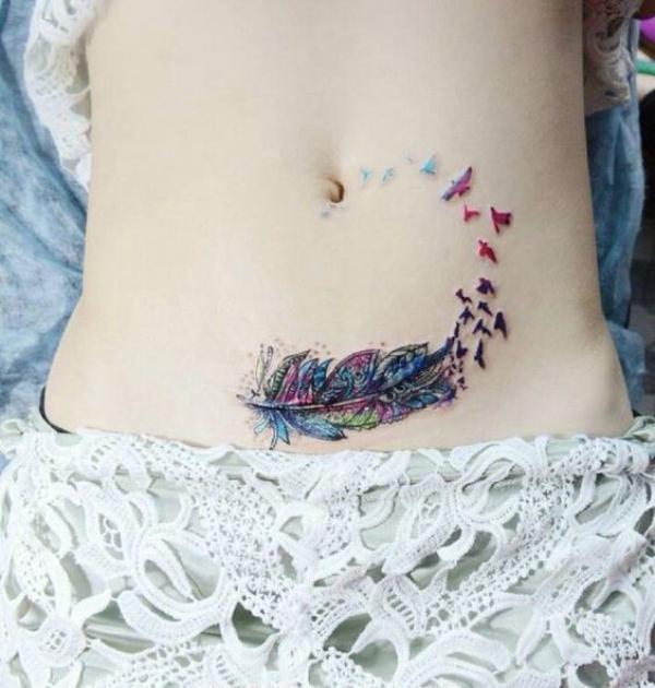 Birds flying from feather tummy tattoo small