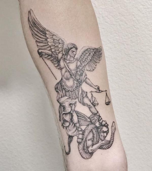 Black and grey St Michael and the Scales of Justice tattoo