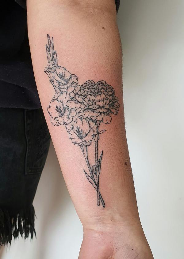 Black and grey carnation and gladiolus tattoo