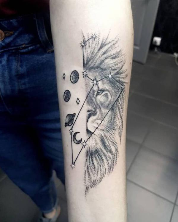 Black and grey half lion with planets and Leo constellation tattoo