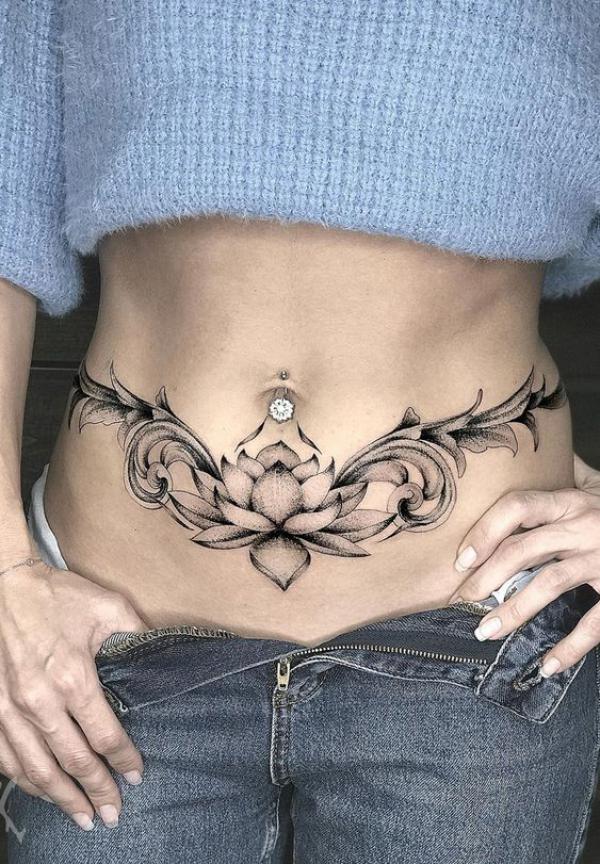 Black and grey lotus tummy tattoo