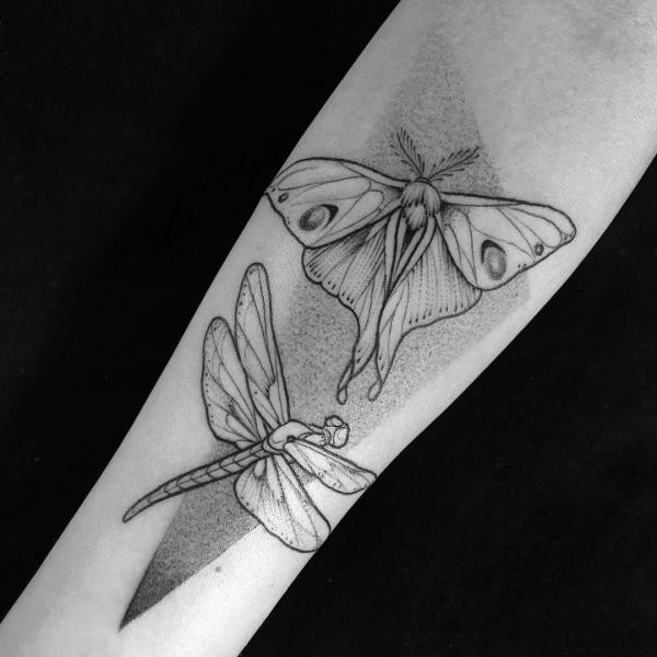 Black and grey luna moth and dragonfly tattoo