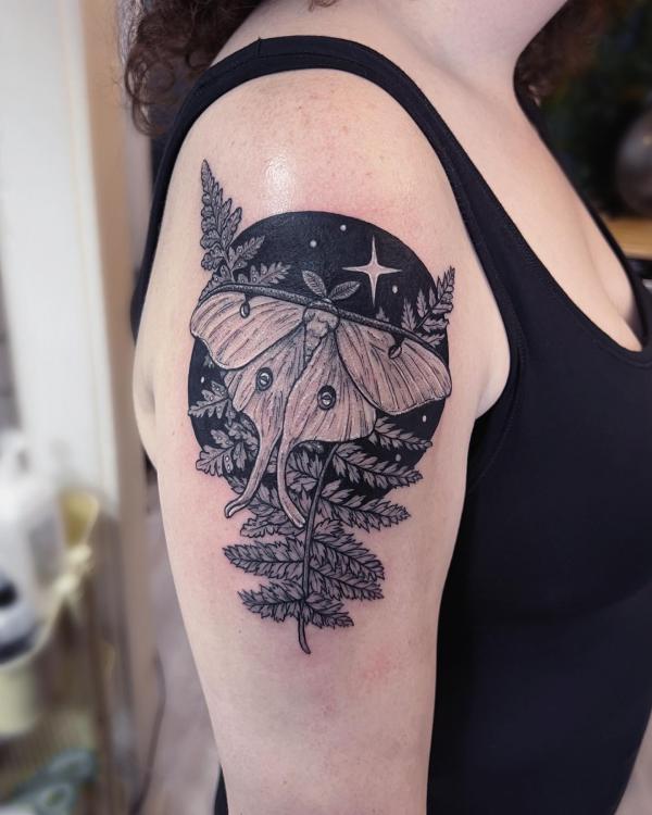 Black and grey luna moth and fern with moon and stars tattoo