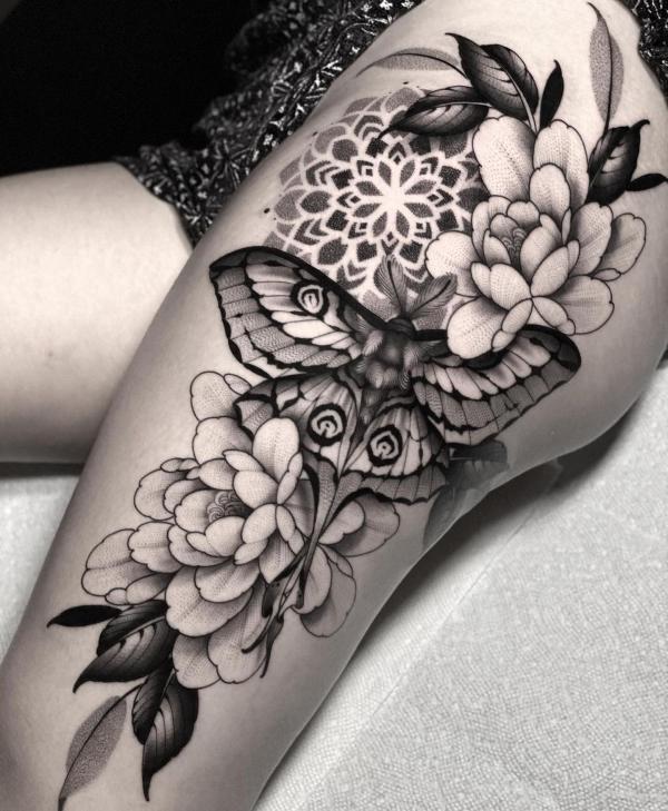 Black and grey luna moth and peonies with mandala tattoo