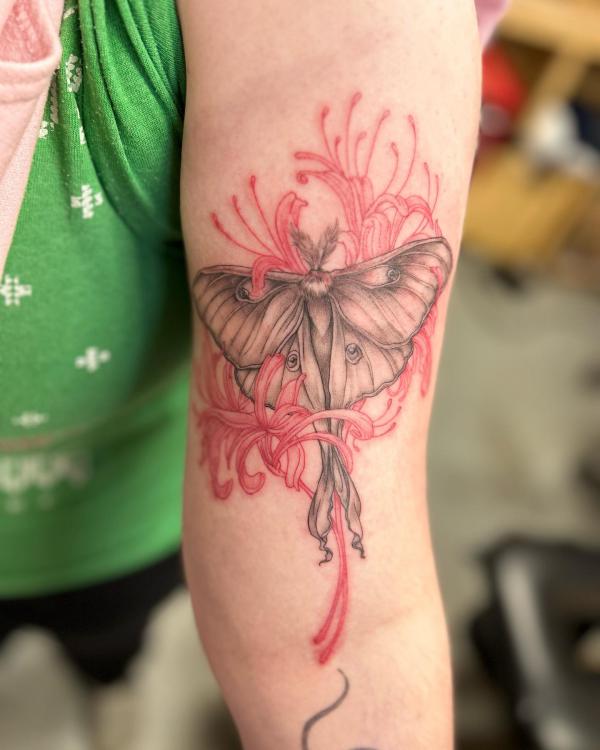 Black and grey luna moth and red spider lily tattoo