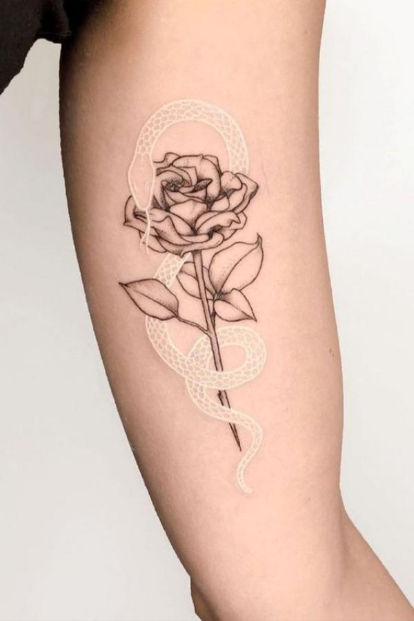 Black and grey rose with white ink snake tattoo