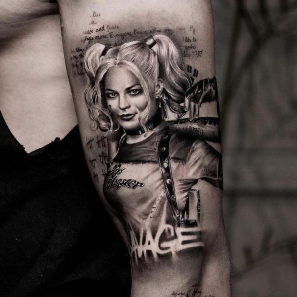 Black and whIte Harley Quinn half sleeve tattoo
