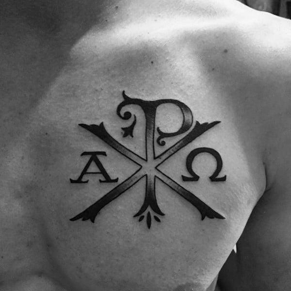 Black and white Chi Rho chest tattoo