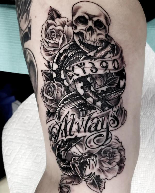 Black and white death eater with roses always tattoo