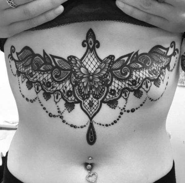 Black and white lace stomach tattoo