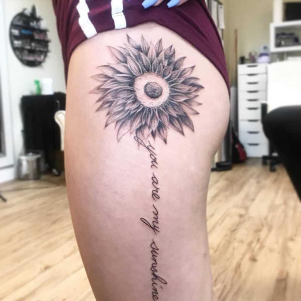 Black anfd grey sunflower with words you are my sunshine leg tattoos
