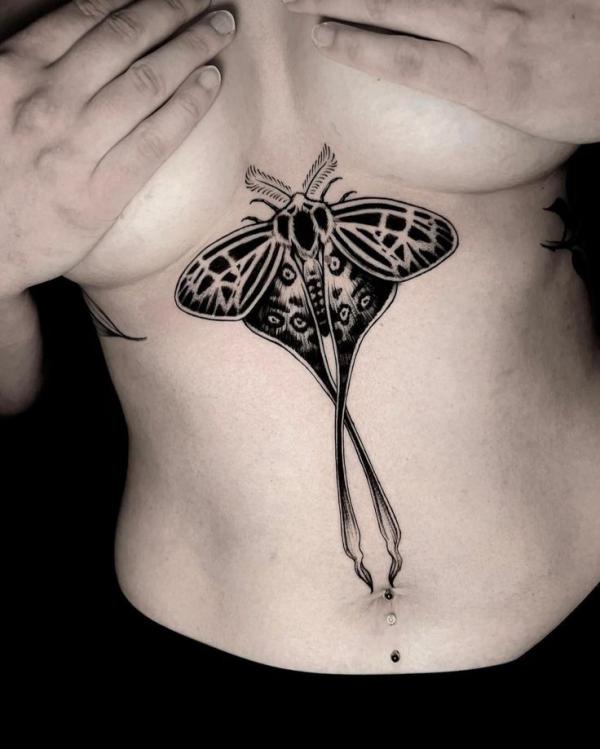 Black luna moth sternum tattoo
