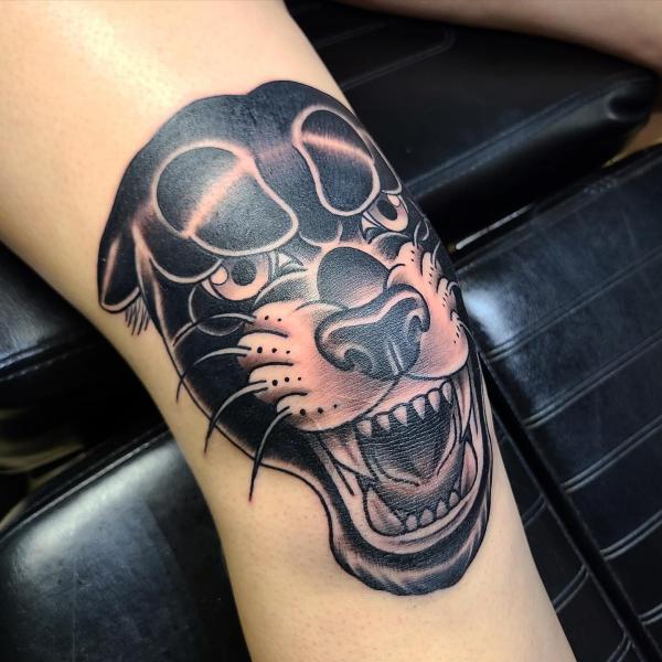 Black panther knee tattoo