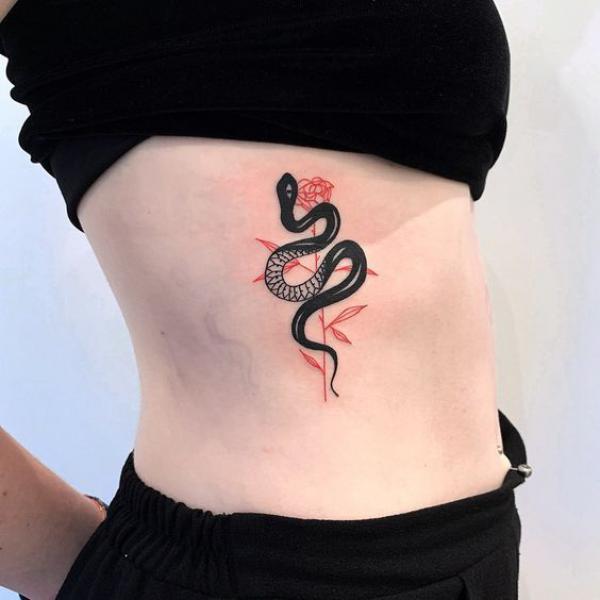 Black snake and red rose side tattoo small
