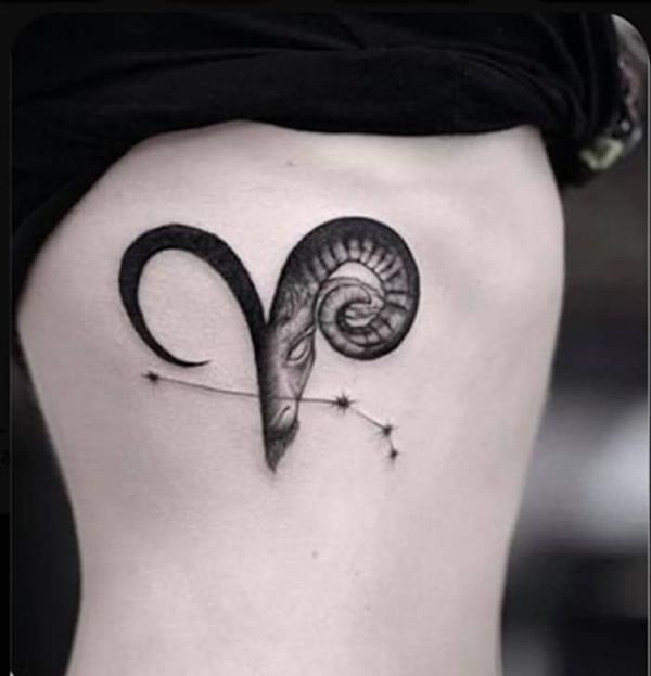 Blackwork Aries with constellation side tattoo