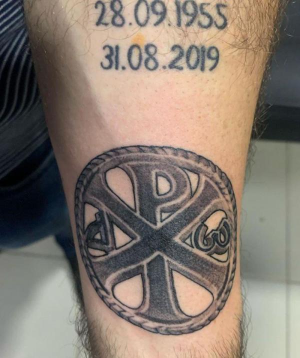 Blackwork Chi Rho tattoo