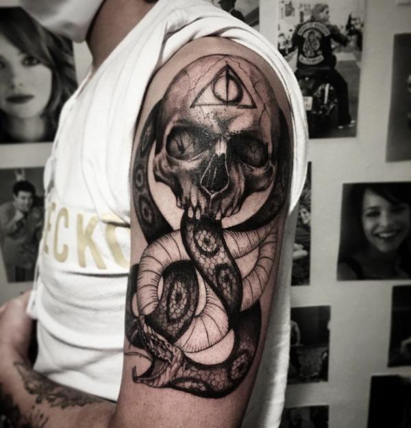 Blackwork death eater with deathly hallows half sleeve tattoo