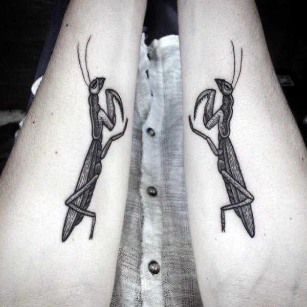 Blackwork praying mantis forearm tattoo
