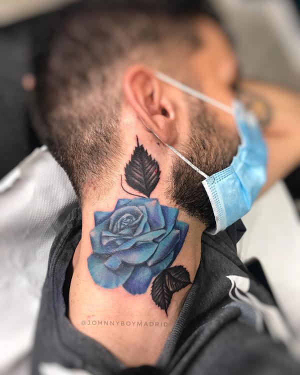Blue rose with black leaves neck tattoo