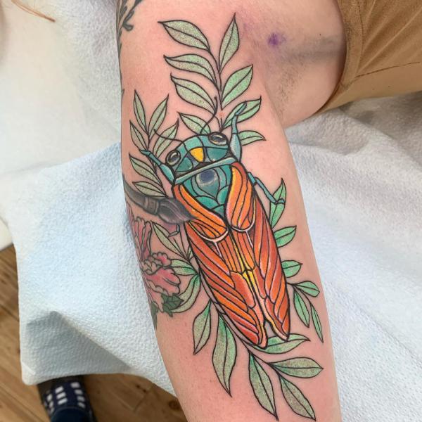 Botanical cicada tattoo yellow and green