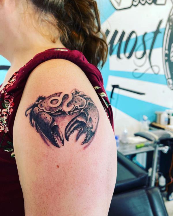 Cancer crab with Leo sign shoulder tatoo