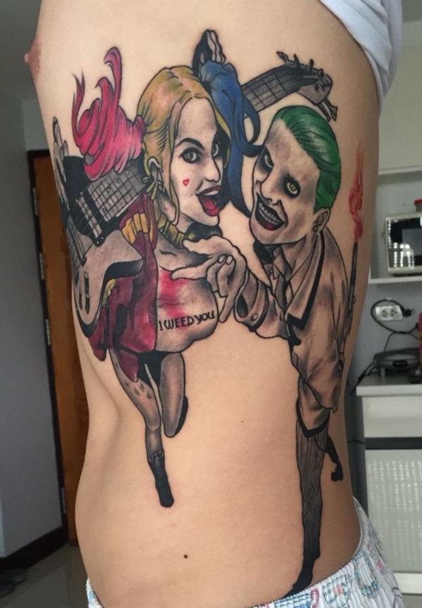 Cartoon Harley Quinn and Joker side tattoo