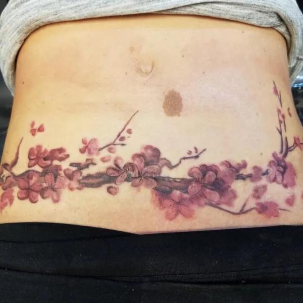 Cherry blossom tummy tuck tattoo