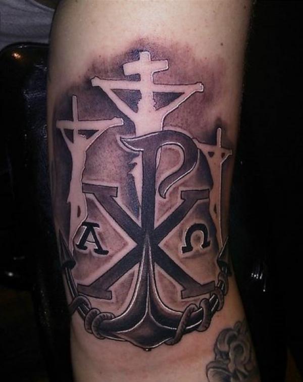 Chi Rho anchor and crucifixion tattoo