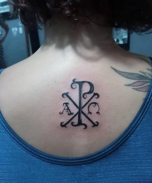 Chi Rho back tattoo