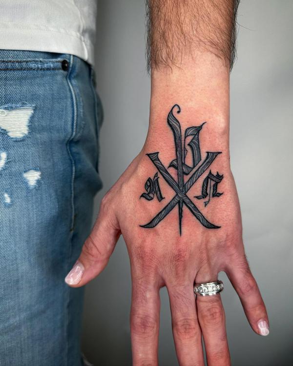 Chi Rho hand tattoo