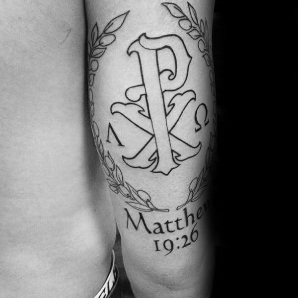 Chi Rho line work tattoo with name and date