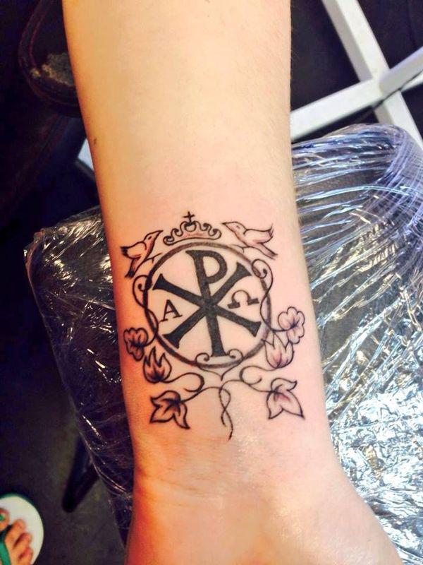 Chi Rho with leaves and crown wrist tattoo