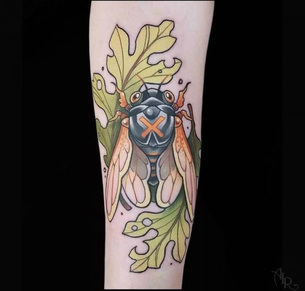 Cicada and oak leaf tattoo
